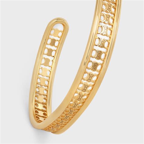 celine cuff gold|Celine.